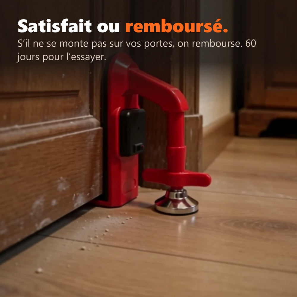 Le bloque-porte BLINDIER rouge posé au sol contre une porte en bois, gros plan sur le pied à vis